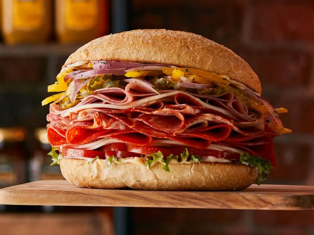 Boar's Head Classic Italian sub with ham, capocollo, salami, pepperoni, provolone, lettuce, tomato, and onion